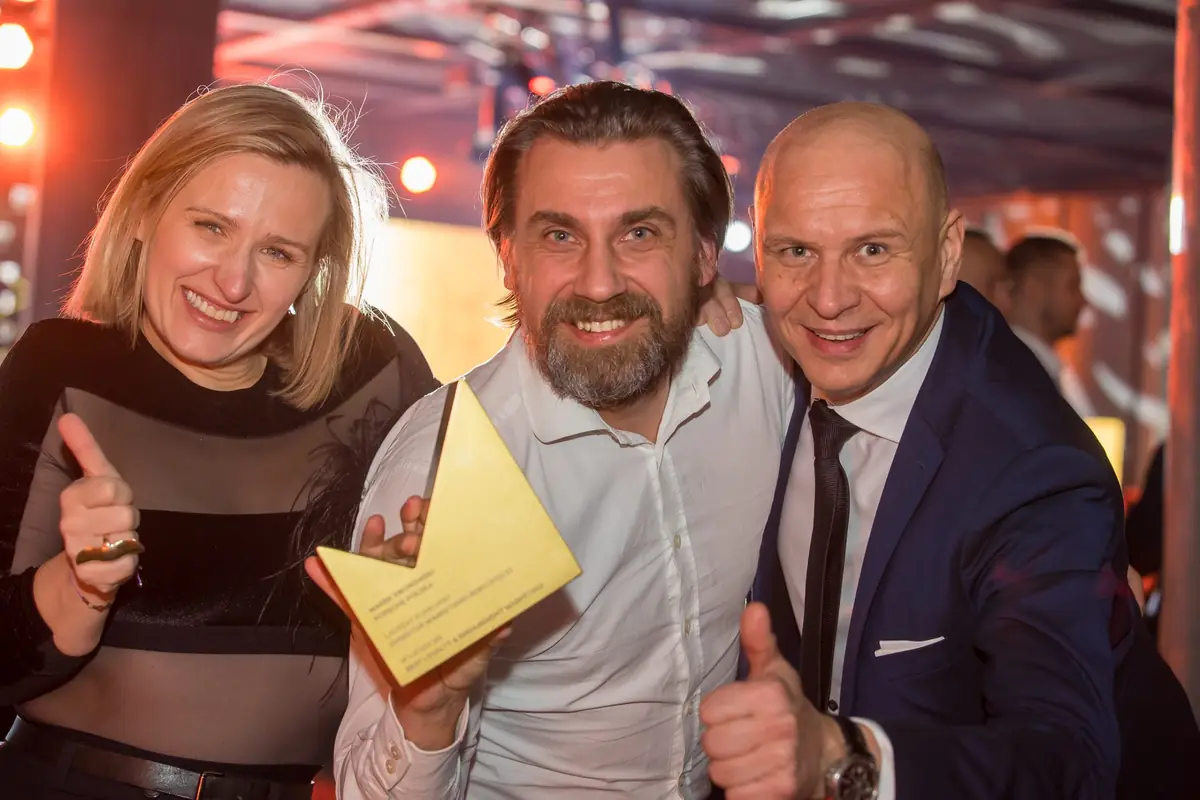 Winners celebrating with the statuette