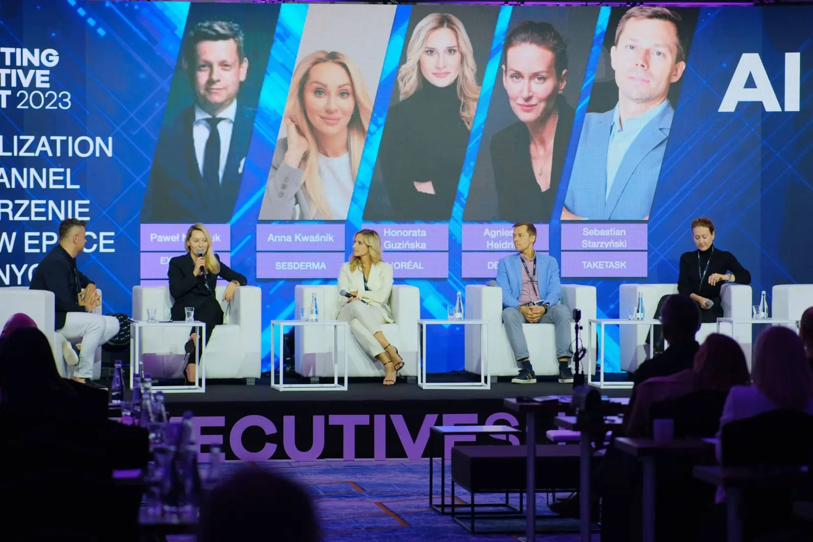 A panel discussion on the CMO Executive Summit stage